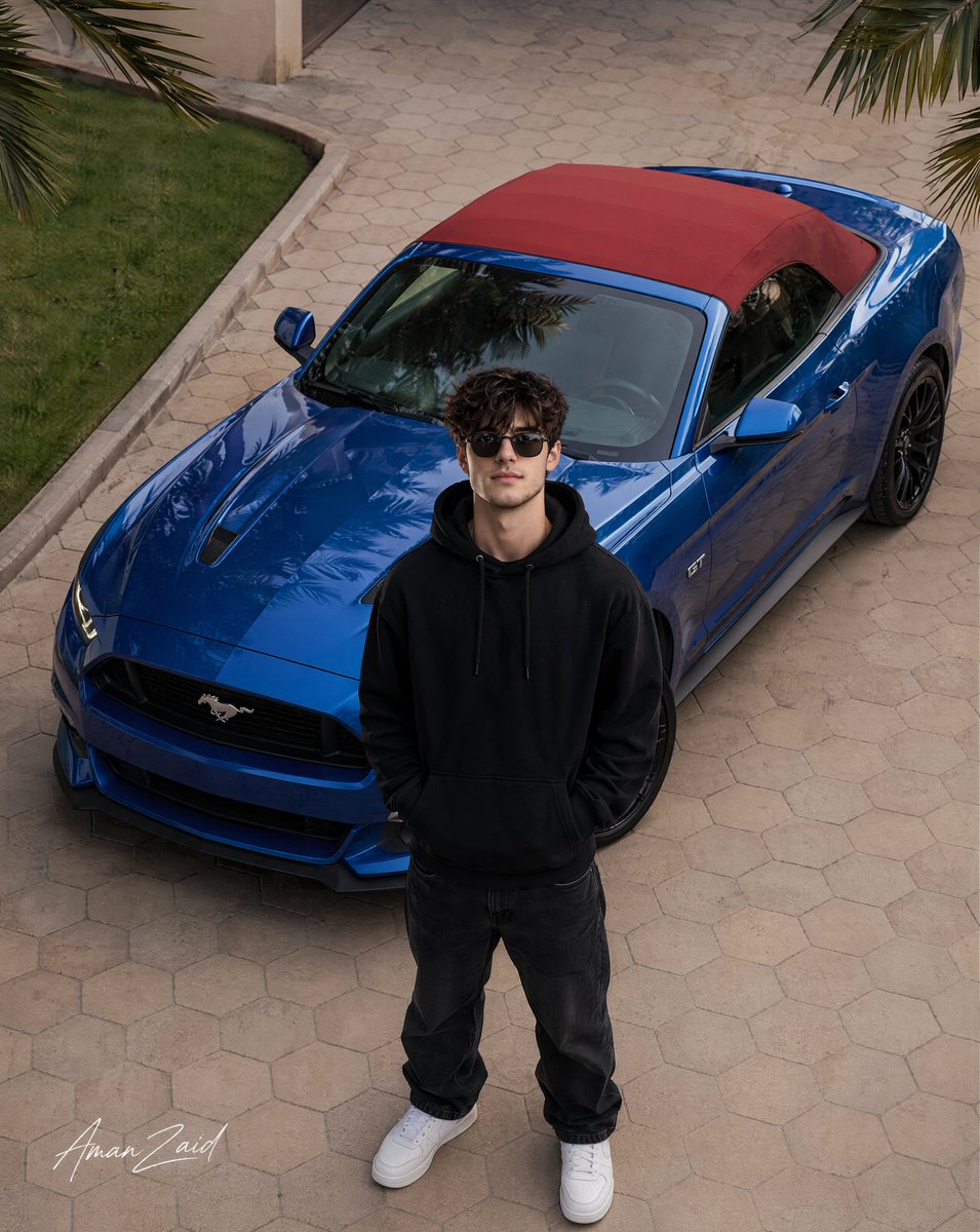 产品视觉 GPT Image 2 提示词：Cinematic portrait of a man with a Ford Mustang